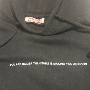 Black “Inside we are all the same” brand sweatshirt